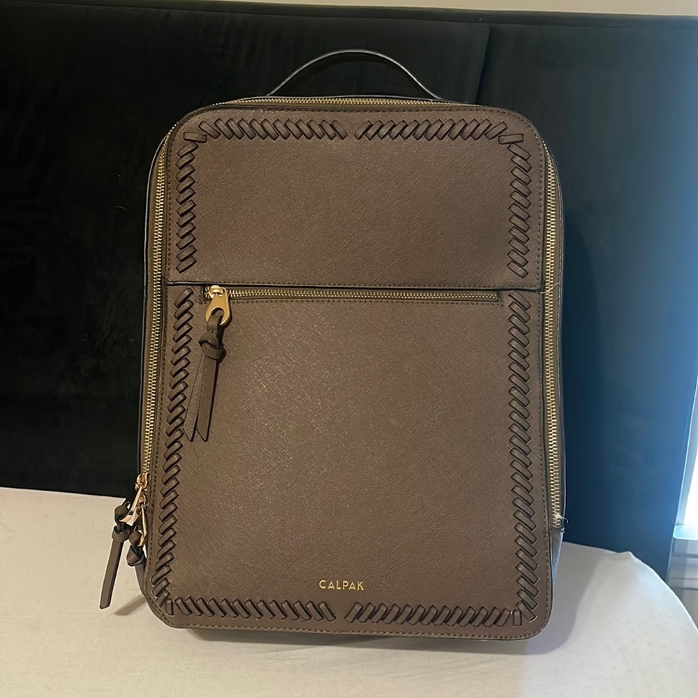 Well Kept Mocha Calpak Laptop Bag